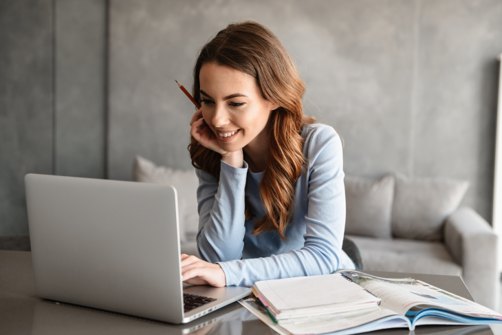 woman on laptop studying online