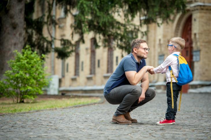 teacher and child at school